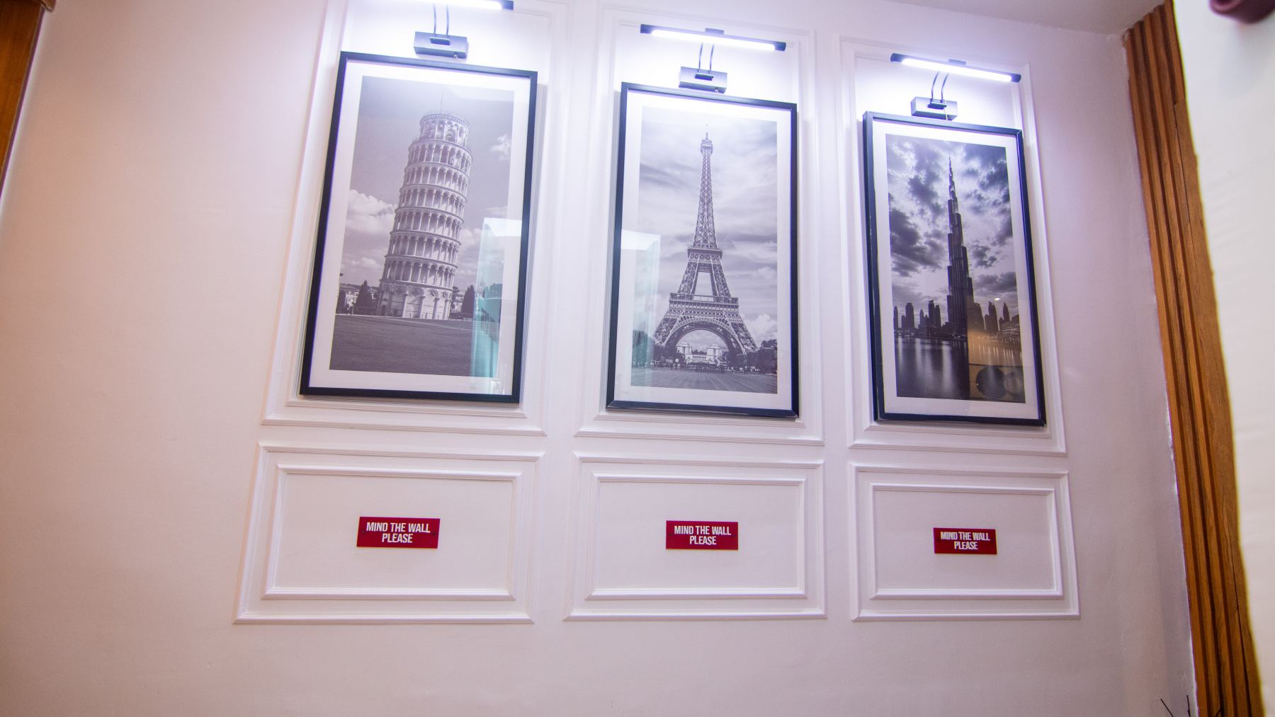 Gallery wall lights at Emperor Suites