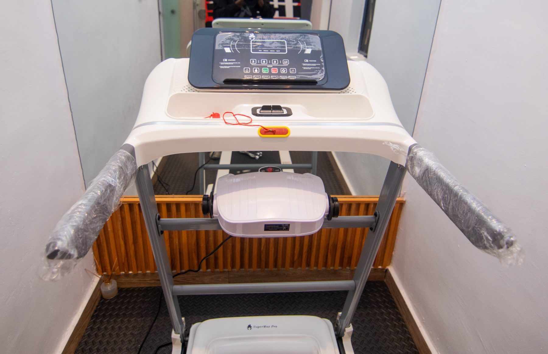 Close view of the gym treadmill console