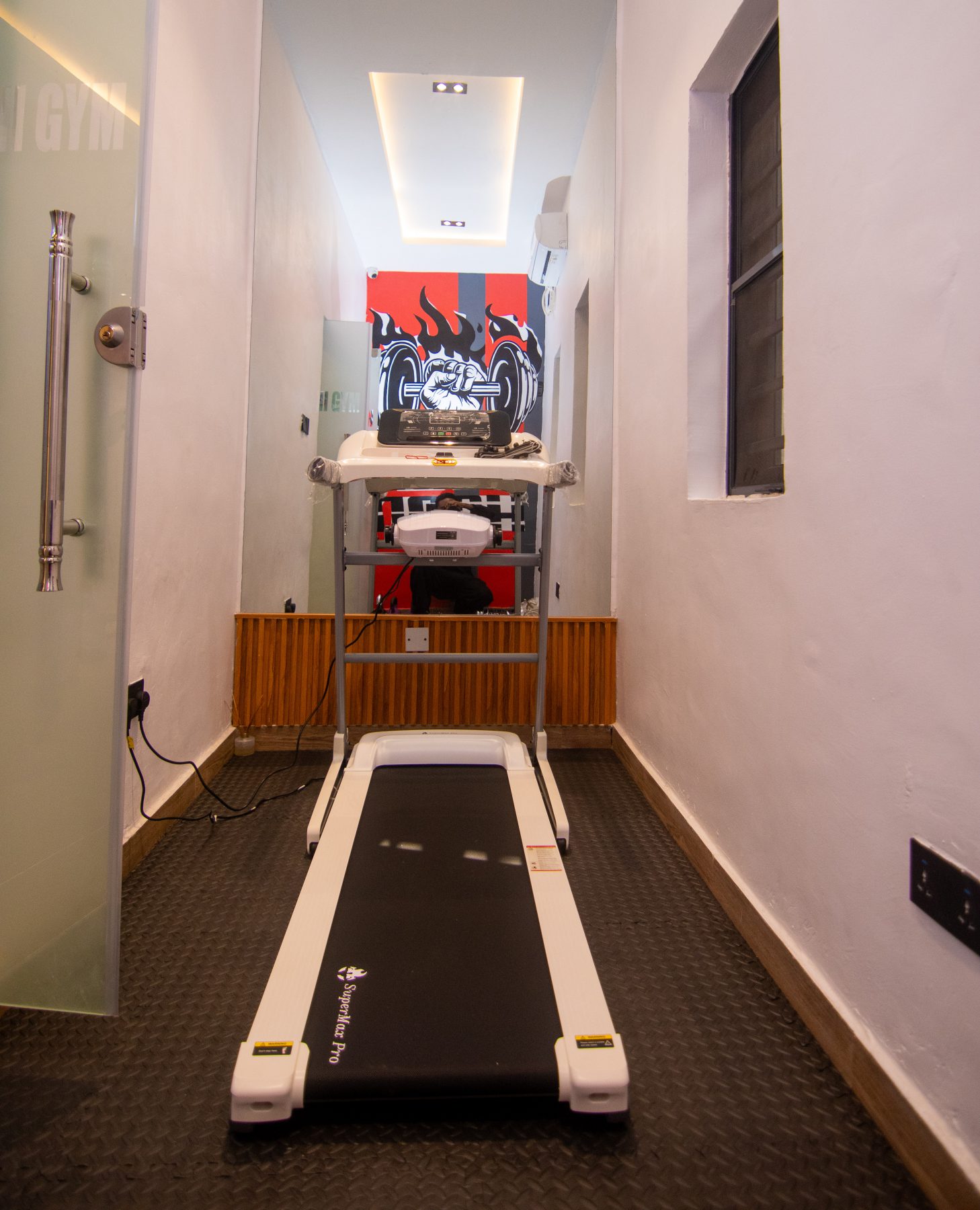 Gym treadmill at Emperor Suites